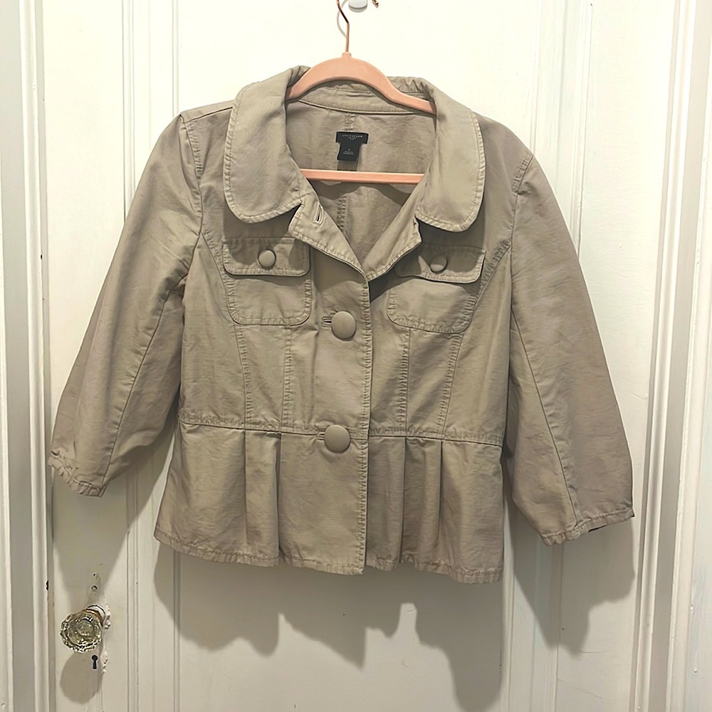 Casual Size 10 Ann Taylor tan jacket with peplum waist and large buttons.